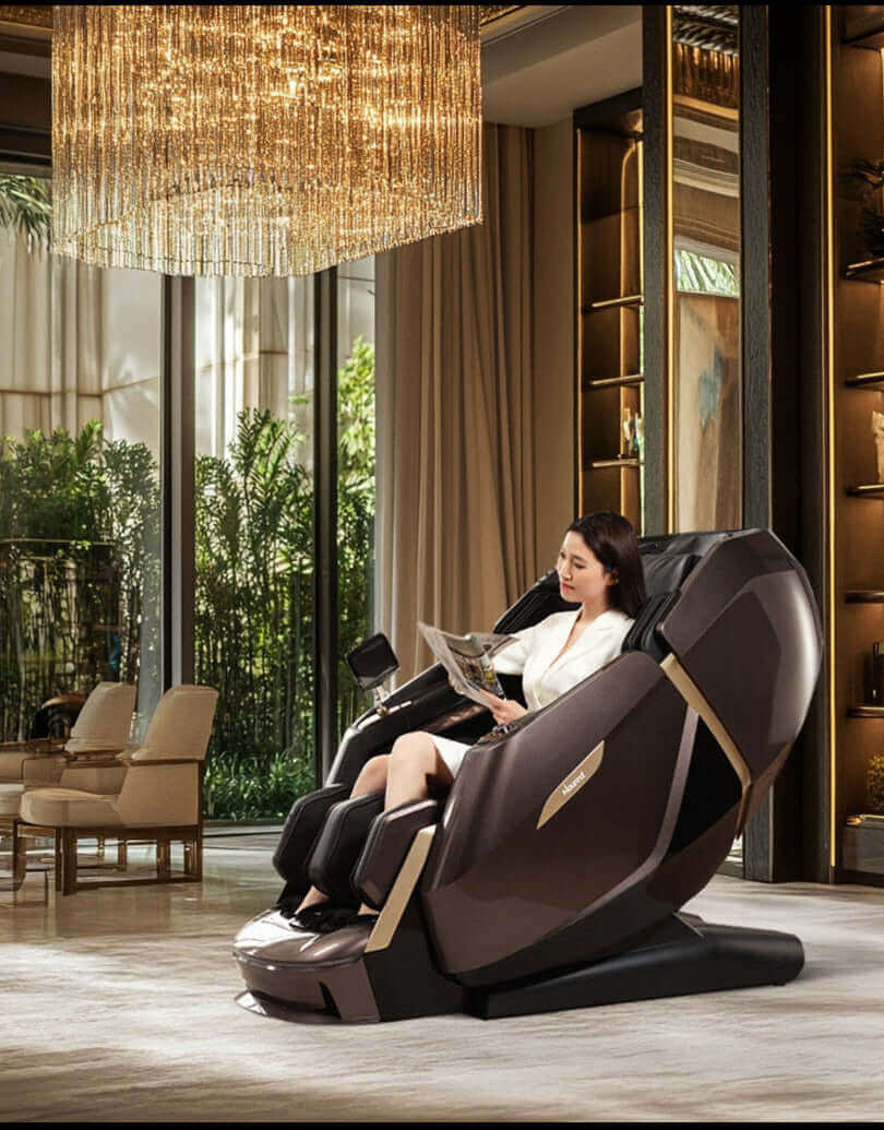 Woman using a nourest massage chair in a luxurious room with large windows and decorative shelves.